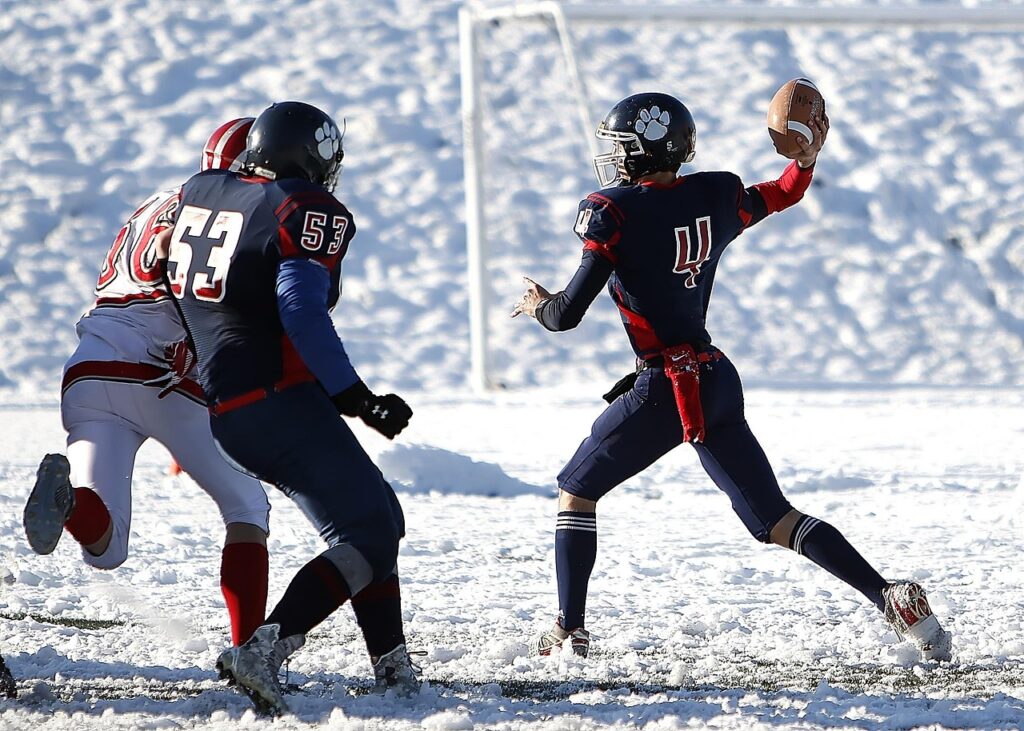 american football, football, nature, quarterback, competition, team, throwing, passing, pass play, pigskin, gridiron, athlete, white, football helmet, blocker, rushing quarterback, high school, teamwork, snow, ice, canada, british columbia, canadian, team leader