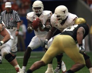 quarterback, football, player, ball, sport, american, american football, field, grass, competition, team, football player, male, helmet, referee, uniform, sports uniform, athlete, pocket, blocker, lineman, action, athletic, outdoor, texas, texan, young, nature, active